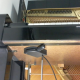 Installation système silencieux pour piano droit